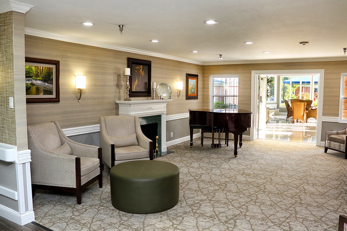 The lobby with chairs and piano at Louisville East